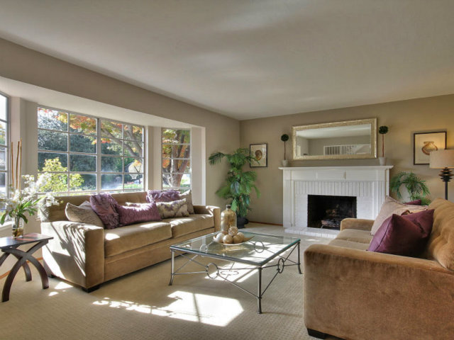 766 Rustic Lane Mountain View, CA 94040 - Photo 4 of 23 a living room with furniture and a fireplace