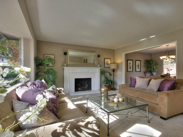 766 Rustic Lane Mountain View, CA 94040 - Photo 5 of 23 a living room with furniture fireplace and a large window