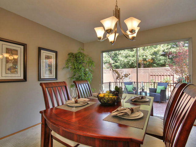 766 Rustic Lane Mountain View, CA 94040 - Photo 8 of 23 a view of a dining room with furniture wooden floor and chandelier