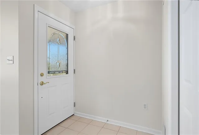 a view of a livingroom with a kitchen