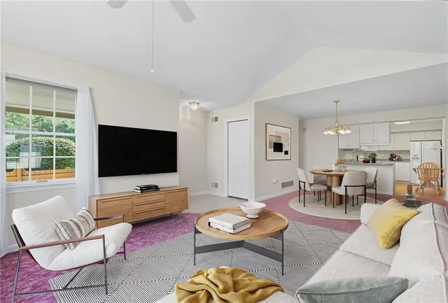 an empty room with windows and entrance