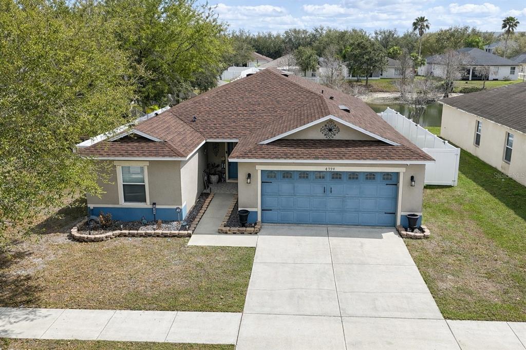 4354 Fieldview Circle Wesley Chapel, FL 33545 - Photo 1 of 15 a front view of a house with a yard