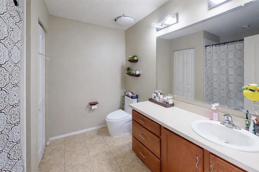 4354 Fieldview Circle Wesley Chapel, FL 33545 - Photo 12 of 15 a bathroom with a sink and a mirror