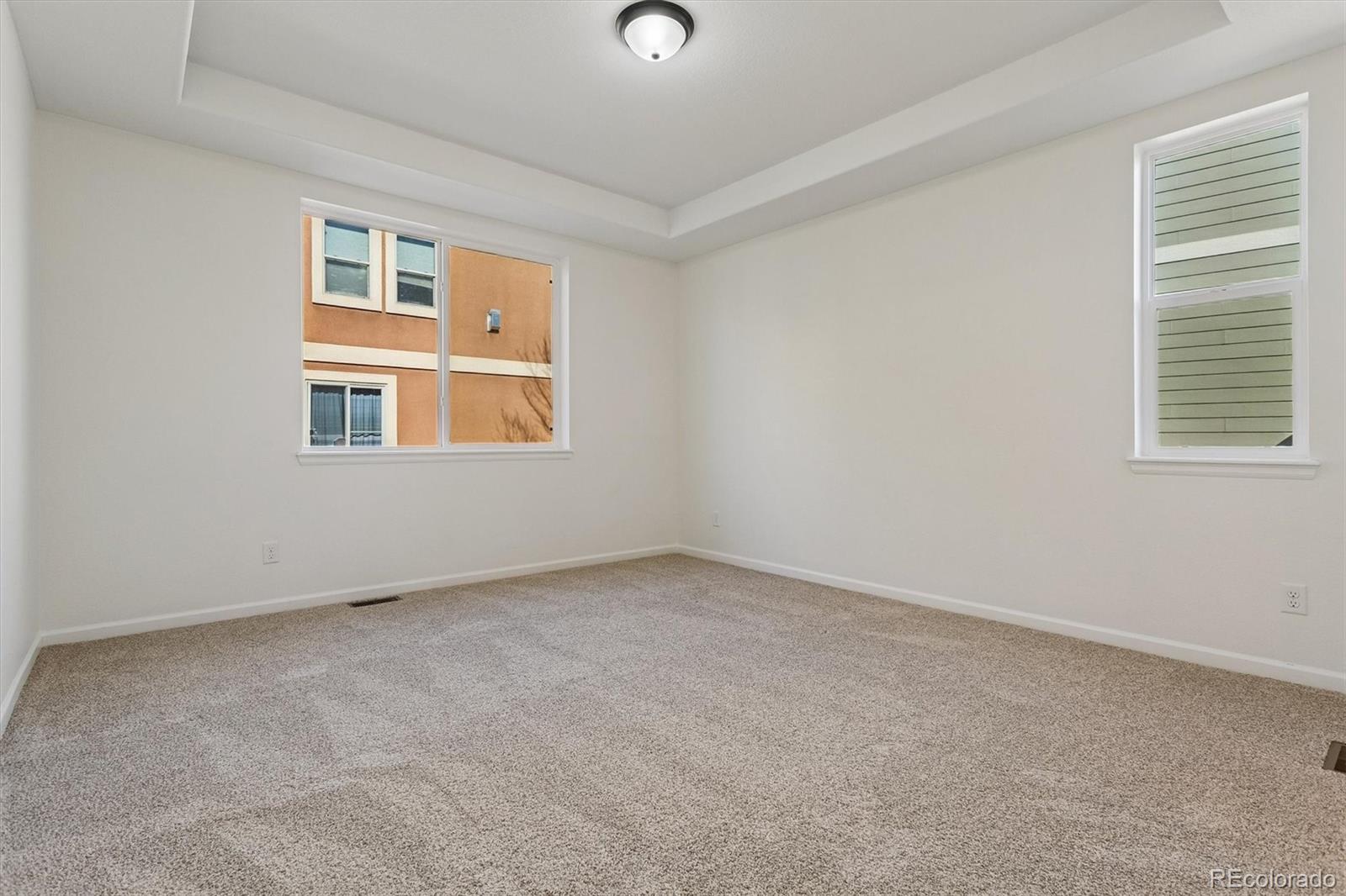 960 Fire Rock Place Colorado Springs, CO 80921 - Photo 12 of 32 an empty room with a window