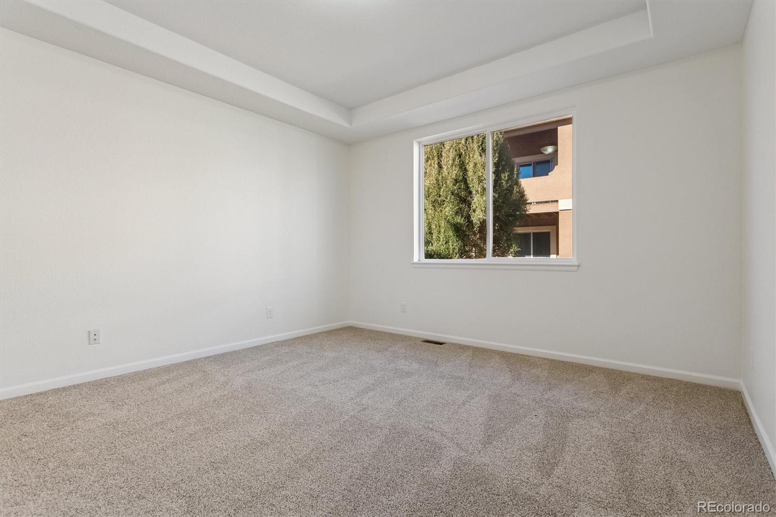 960 Fire Rock Place Colorado Springs, CO 80921 - Photo 21 of 32 an empty room with a window