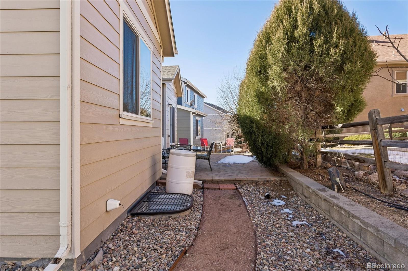 960 Fire Rock Place Colorado Springs, CO 80921 - Photo 31 of 32 a view of a pathway with a house