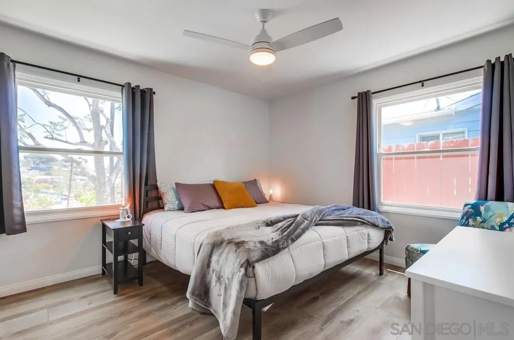 4724 Troy Lane La Mesa, CA 91942 - Photo 24 of 49 a bedroom with a bed and a window