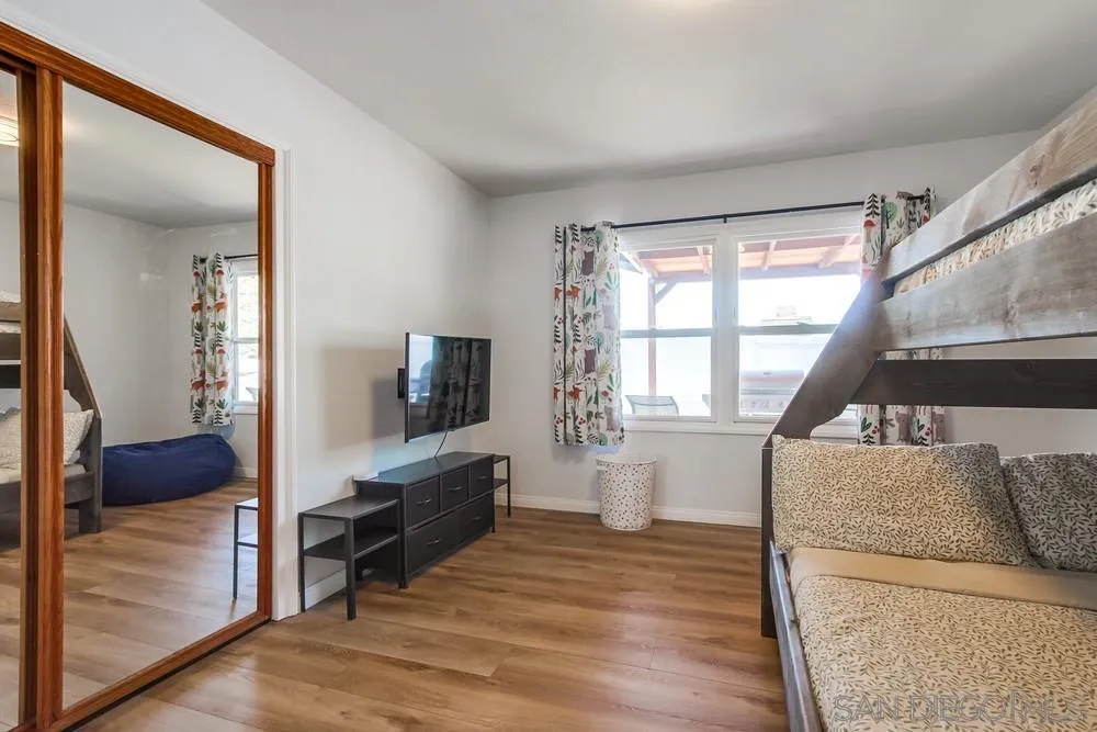 4724 Troy Lane La Mesa, CA 91942 - Photo 26 of 49 a living room with furniture and a flat screen tv