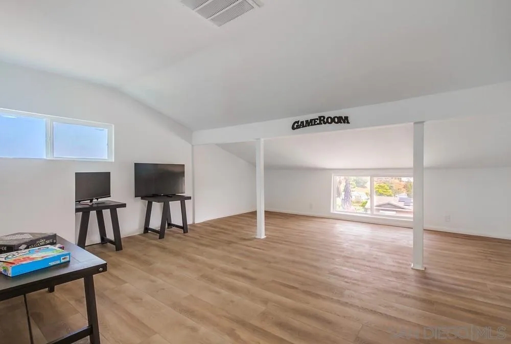 4724 Troy Lane La Mesa, CA 91942 - Photo 33 of 49 a view of room with furniture and wooden floor