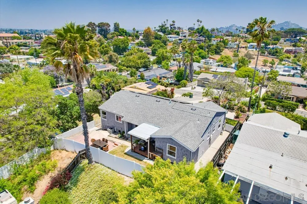 4724 Troy Lane La Mesa, CA 91942 - Photo 40 of 49 an aerial view of a house with a swimming pool yard and outdoor seating