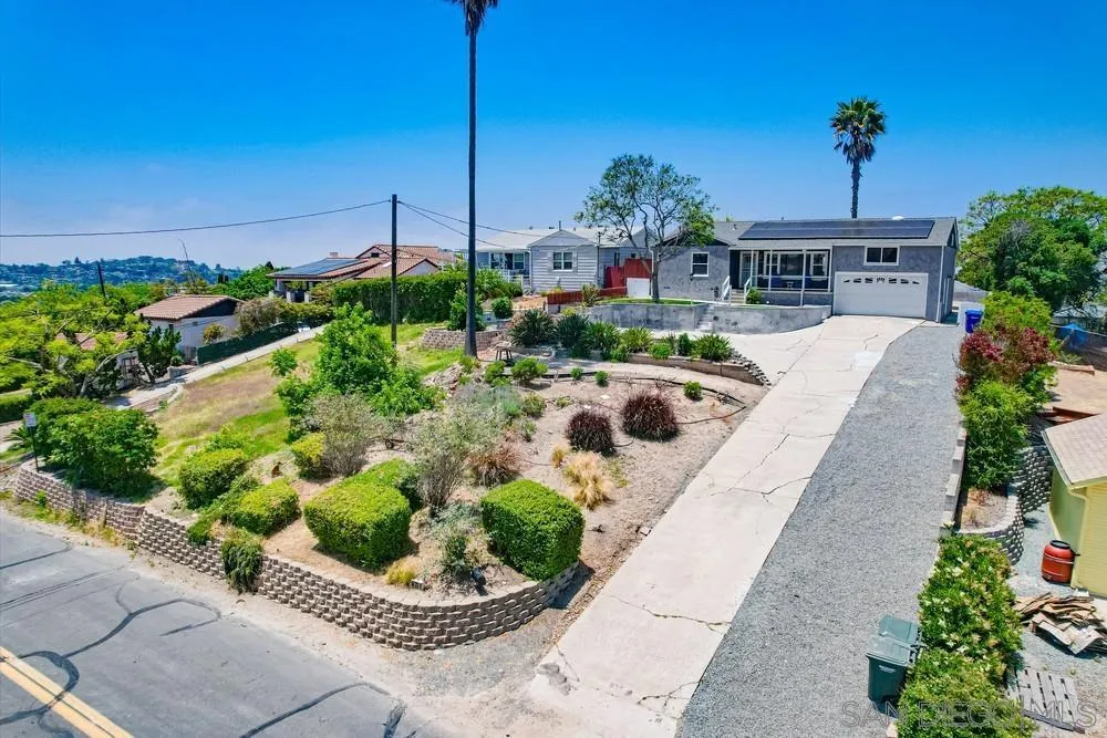 4724 Troy Lane La Mesa, CA 91942 - Photo 48 of 49 a front view of a house with a yard