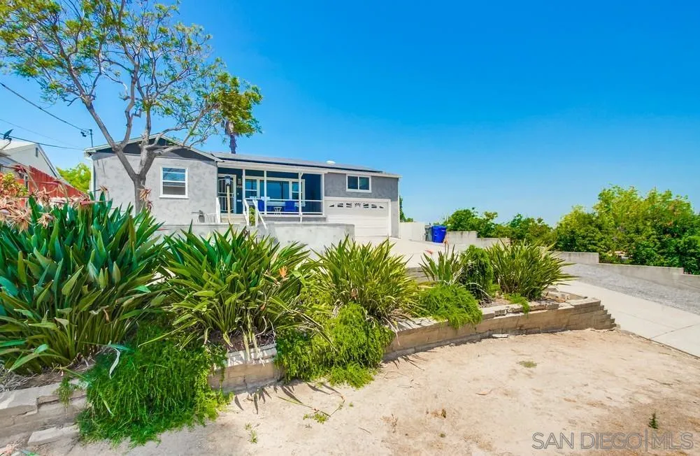 4724 Troy Lane La Mesa, CA 91942 - Photo 49 of 49 a front view of a house with a yard