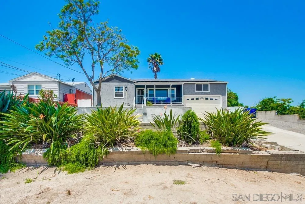 4724 Troy Lane La Mesa, CA 91942 - Photo 8 of 49 a front view of a house with a yard