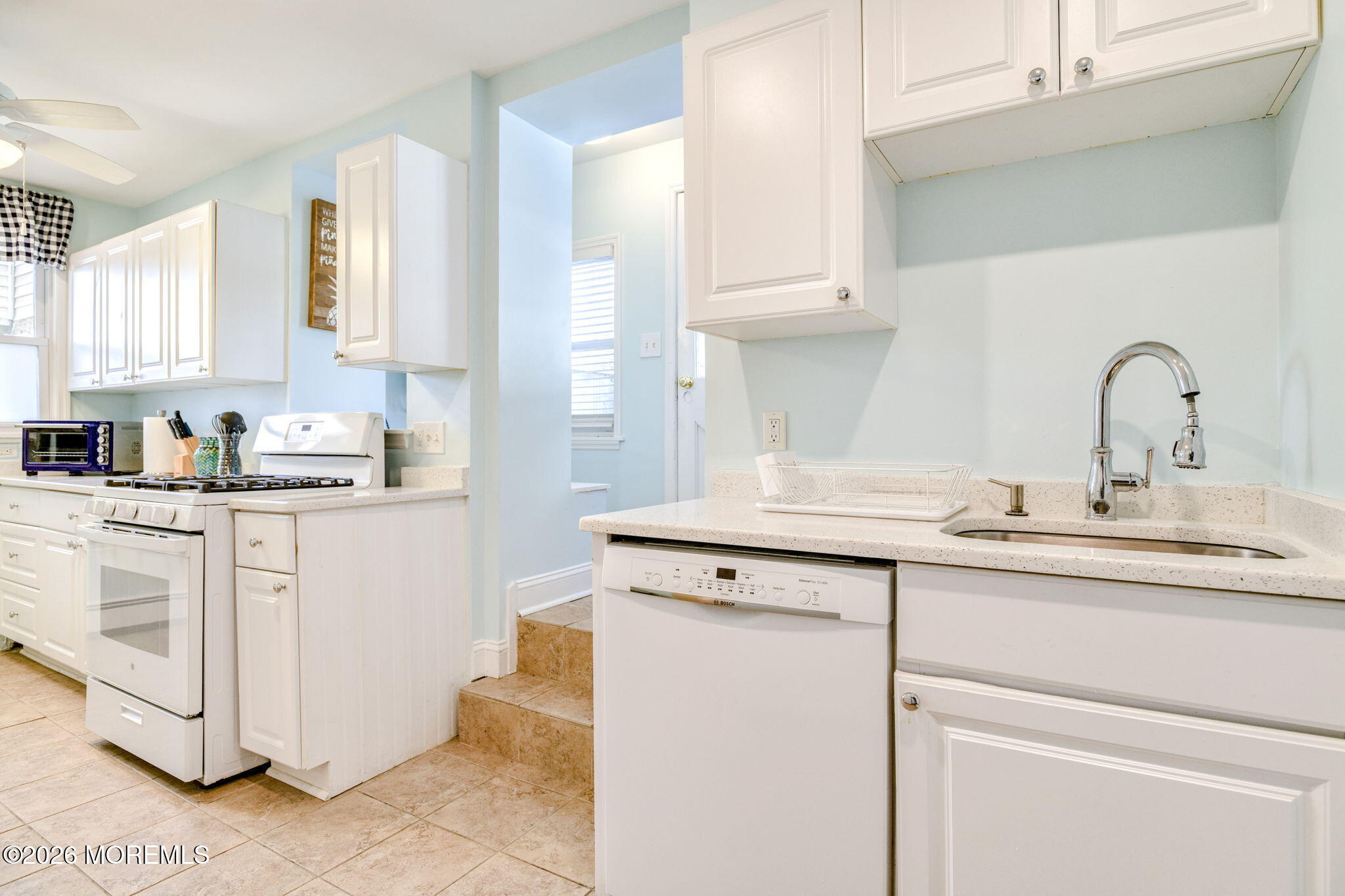 18 Abbott Avenue, Unit GARDEN Ocean Grove, NJ 07756 - Photo 11 of 16 a kitchen with appliances a sink and cabinets