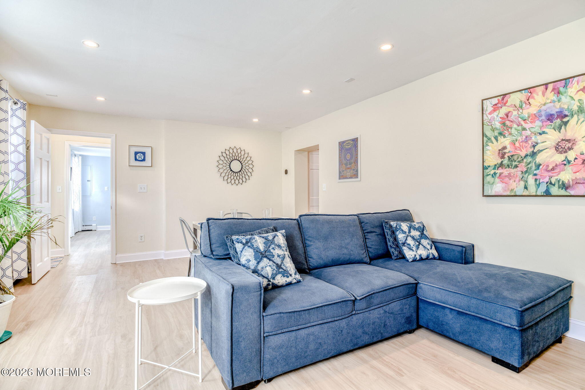 18 Abbott Avenue, Unit GARDEN Ocean Grove, NJ 07756 - Photo 2 of 16 a living room with furniture