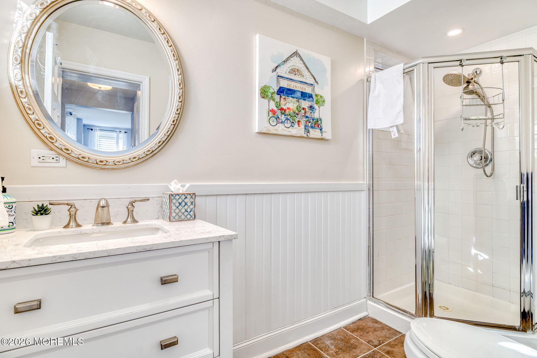 18 Abbott Avenue, Unit GARDEN Ocean Grove, NJ 07756 - Photo 7 of 16 a bathroom with a sink a mirror and a shower
