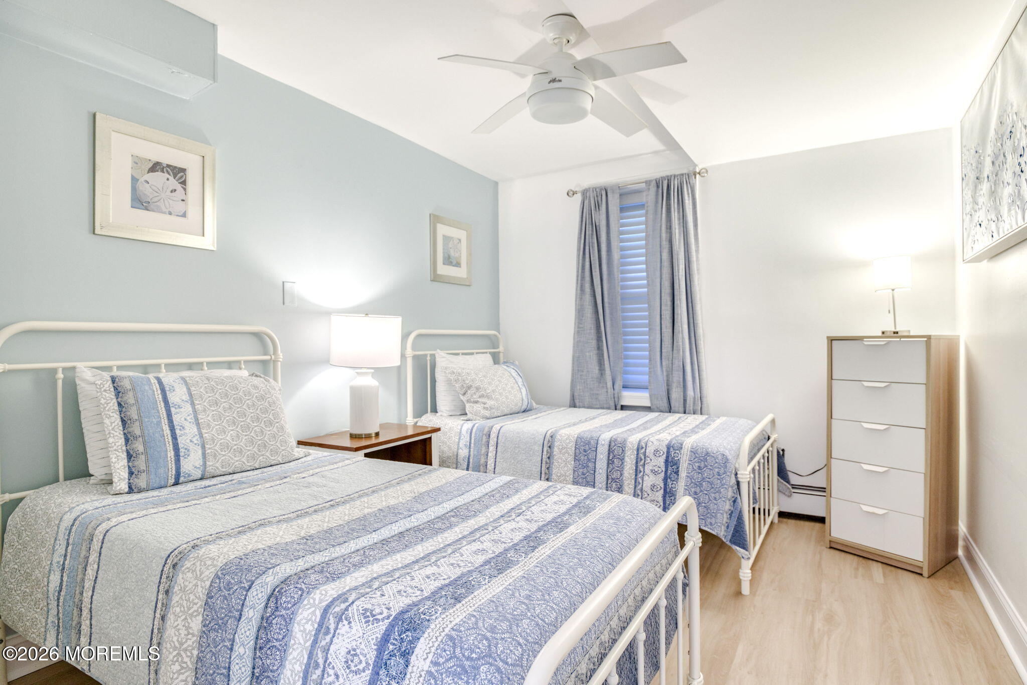 18 Abbott Avenue, Unit GARDEN Ocean Grove, NJ 07756 - Photo 8 of 16 a bedroom with two beds and a window