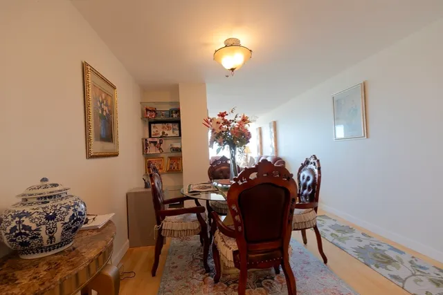 a view of a hallway with chairs