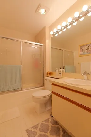 a group of people sitting in porch with window