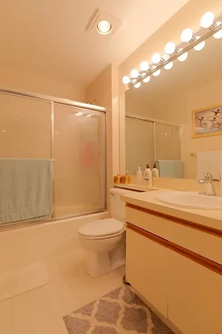 a group of people sitting in porch with window