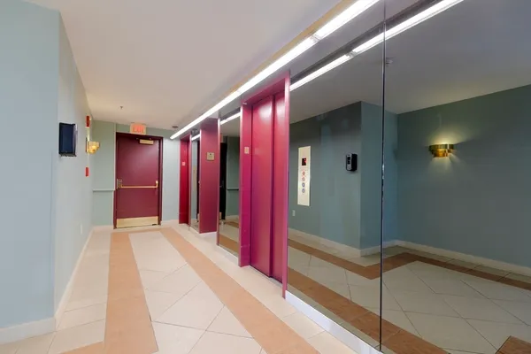 a view of a hallway with painted walls