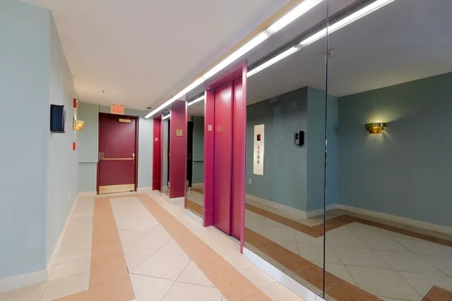 a view of a hallway with painted walls
