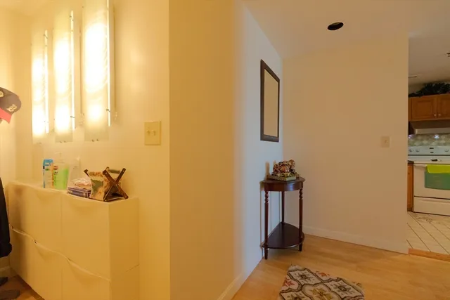 a kitchen with sink refrigerator and stove