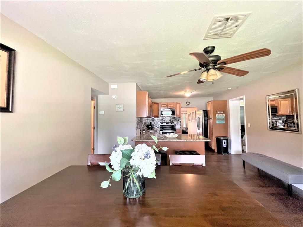 5106 104th Street North St. Petersburg, FL 33708 - Photo 11 of 35 a living room with furniture and a large window