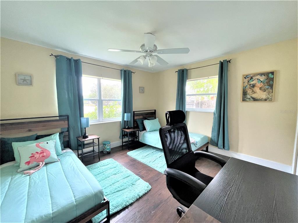 5106 104th Street North St. Petersburg, FL 33708 - Photo 23 of 35 a living room with furniture and a window