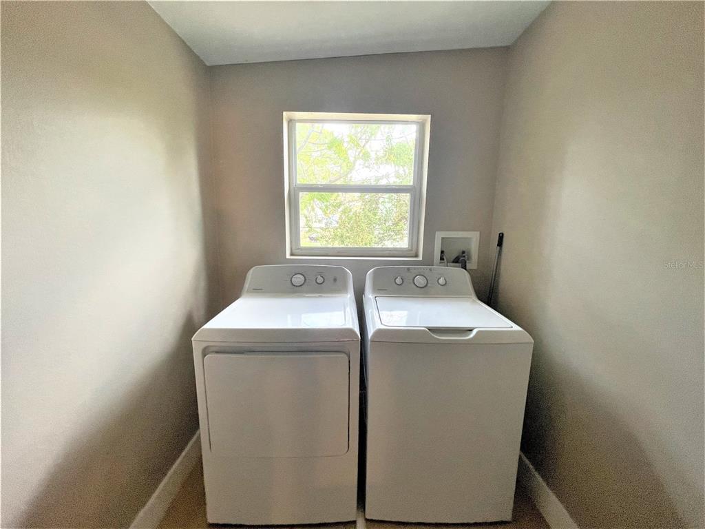 5106 104th Street North St. Petersburg, FL 33708 - Photo 26 of 35 a utility room with dryer and washer
