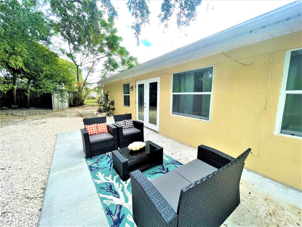 5106 104th Street North St. Petersburg, FL 33708 - Photo 29 of 35 a outdoor living space with patio furniture