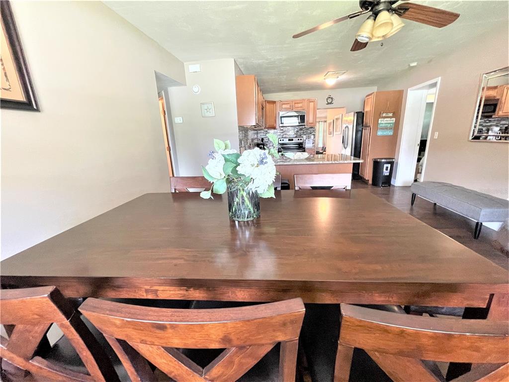 5106 104th Street North St. Petersburg, FL 33708 - Photo 10 of 35 a view of a living room and dining room