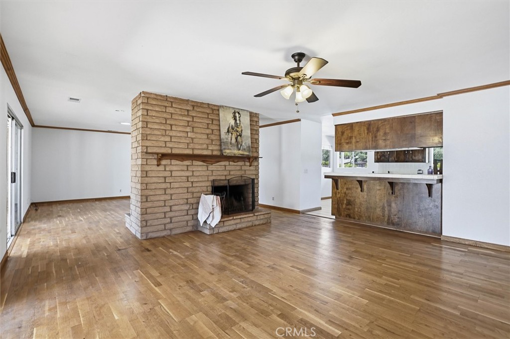 652 Pomeroy Road Nipomo, CA 93444 - Photo 11 of 60 Dining room with dual sided fireplace