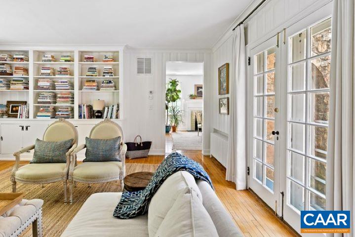 123 Cameron Lane Charlottesville, VA 22903 - Photo 12 of 43 a living room with furniture fireplace and wooden floor
