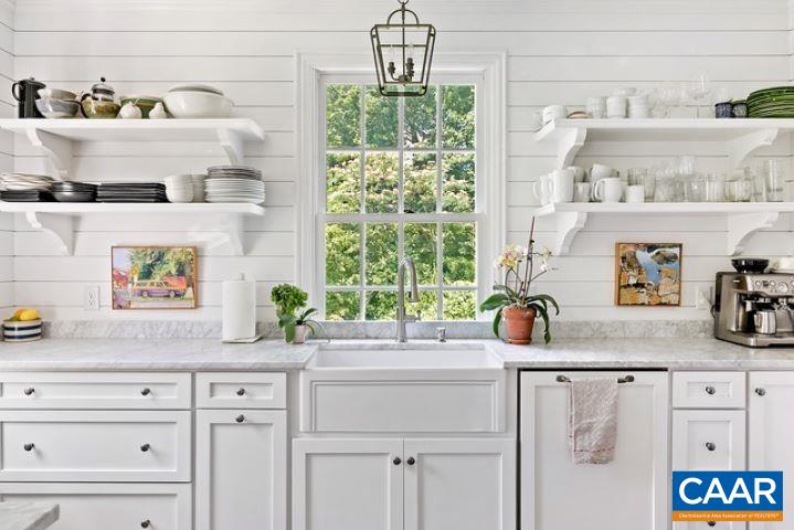 123 Cameron Lane Charlottesville, VA 22903 - Photo 15 of 43 a kitchen with white cabinets and window