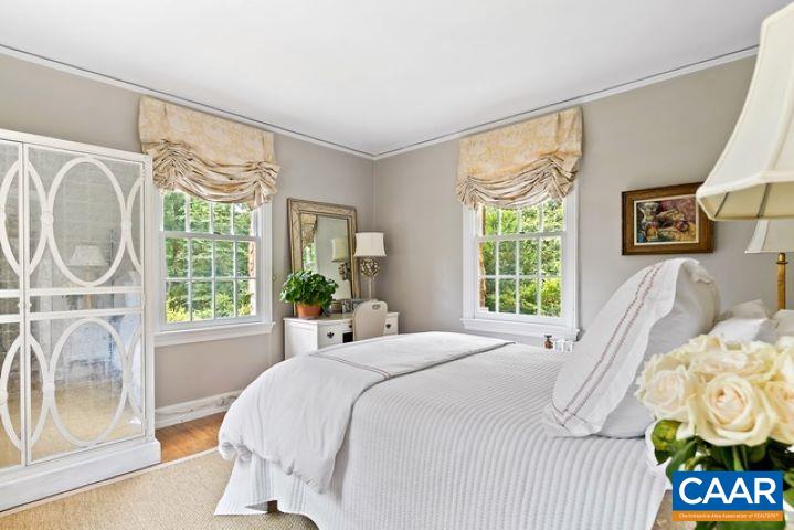 123 Cameron Lane Charlottesville, VA 22903 - Photo 17 of 43 a bedroom with a bed and a window