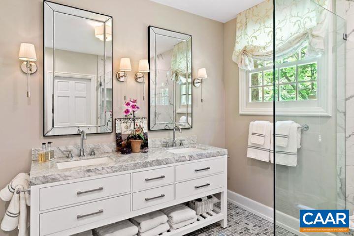 123 Cameron Lane Charlottesville, VA 22903 - Photo 20 of 43 a bathroom with a granite countertop sink vanity mirror next to a window