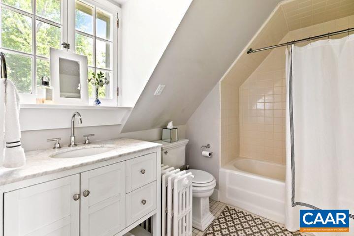 123 Cameron Lane Charlottesville, VA 22903 - Photo 26 of 43 a bathroom with a granite countertop sink toilet and shower