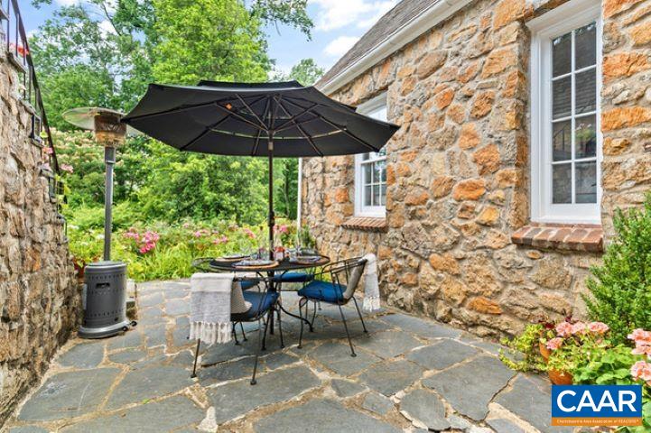 123 Cameron Lane Charlottesville, VA 22903 - Photo 28 of 43 a view of chair and tables in the patio
