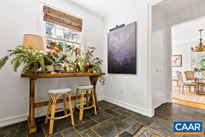 123 Cameron Lane Charlottesville, VA 22903 - Photo 3 of 43 a view of a dining room with furniture and wooden floor