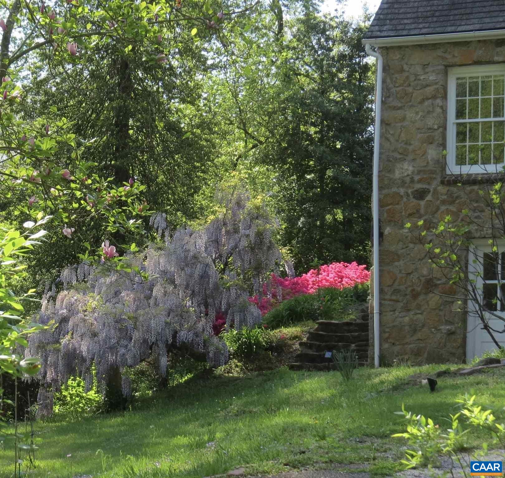 123 Cameron Lane Charlottesville, VA 22903 - Photo 34 of 43 a view of a wooden house and a yard