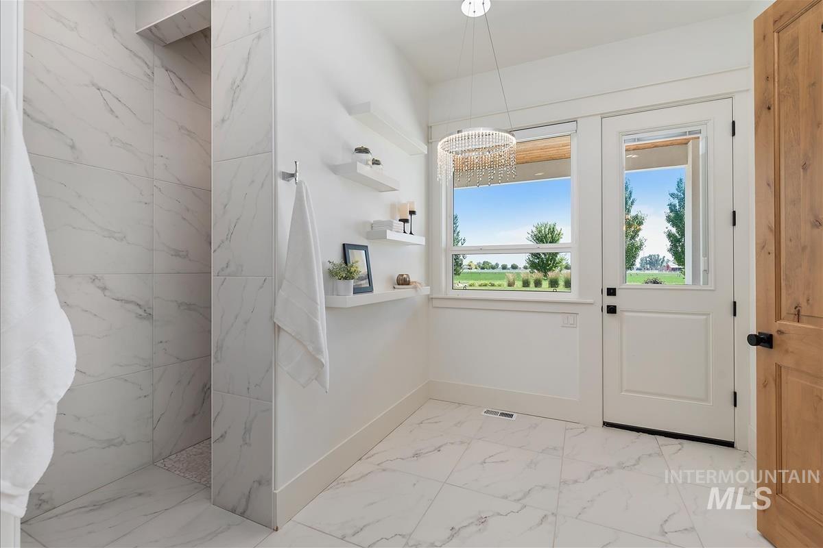 8195 Joplin Road Nampa, ID 83687 - Photo 24 of 50 Heated floors and designed/plumbed for tub.
