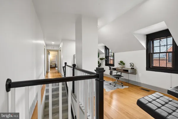 a bathroom with a shower and a bath tub