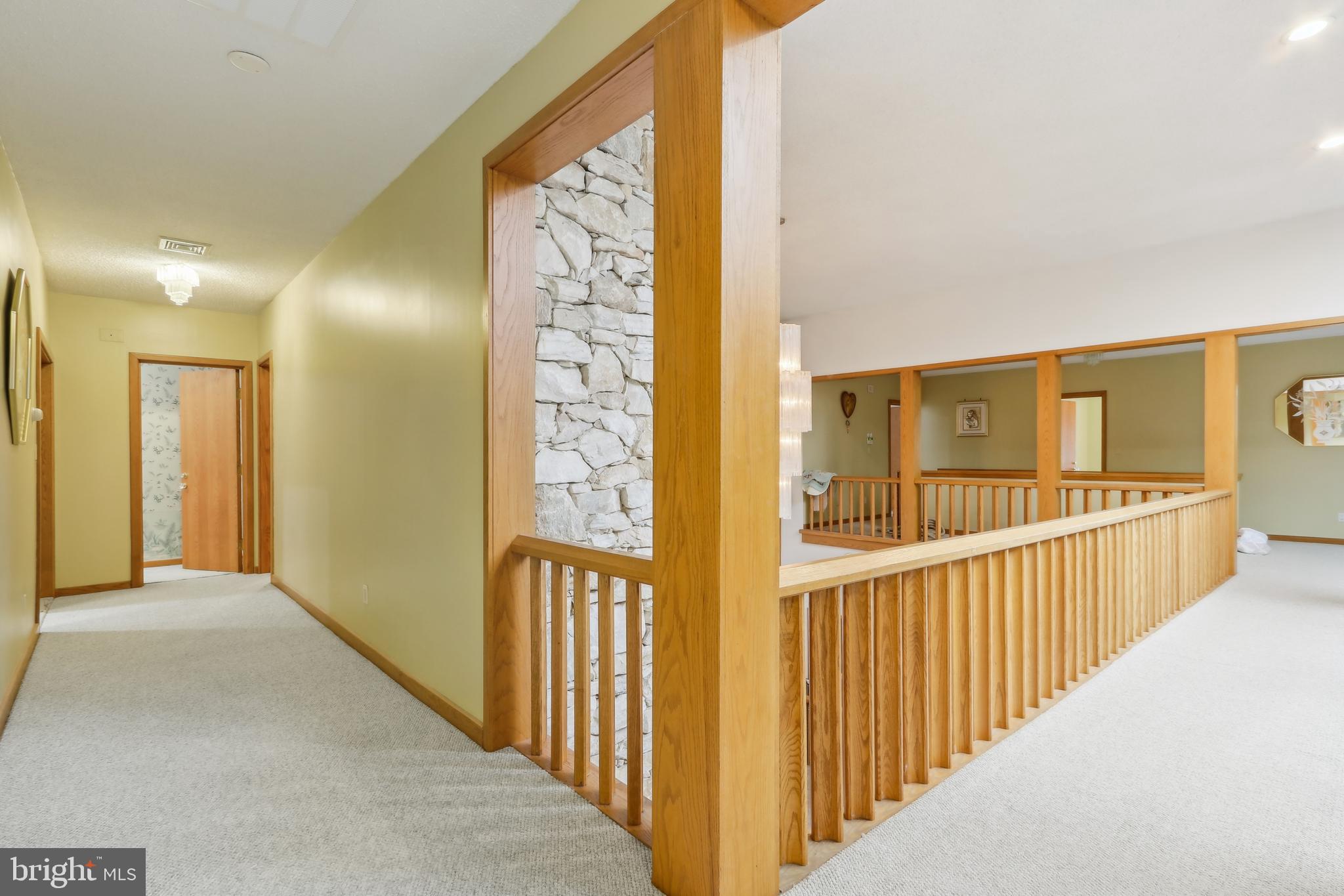 27 Cannon Range Road Milmay, NJ 08340 - Photo 86 of 95 a view of a hallway with wooden floor and windows