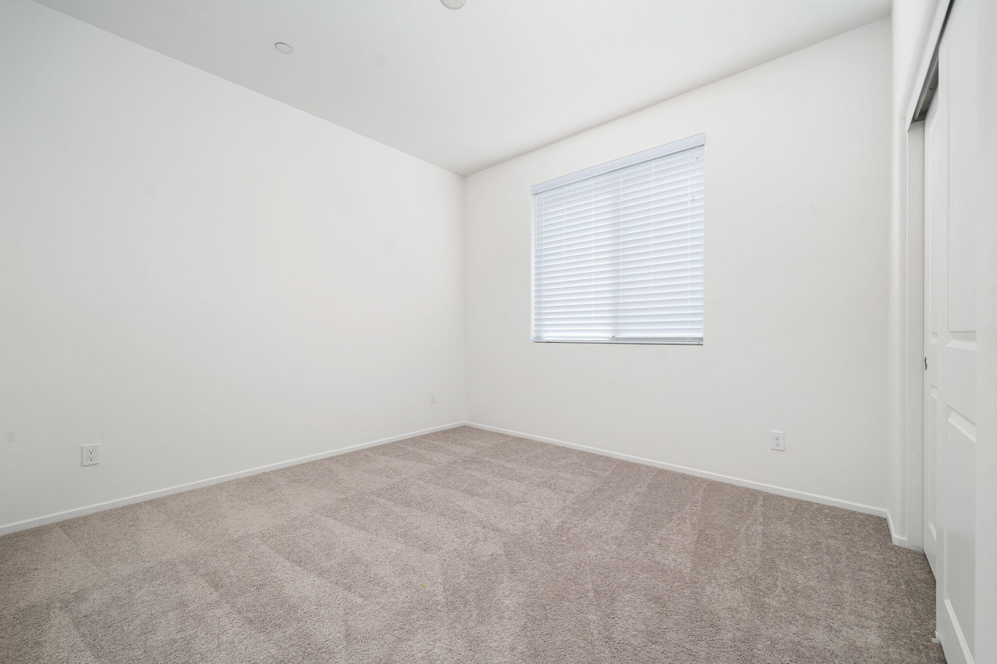 50252 Paseo Barcelona Coachella, CA 92236 - Photo 13 of 23 an empty room with a window
