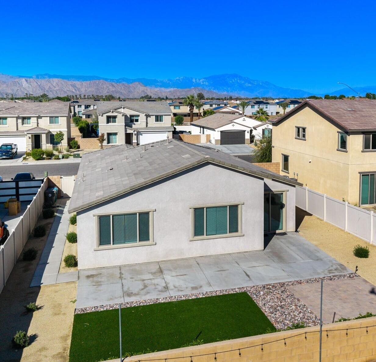 50252 Paseo Barcelona Coachella, CA 92236 - Photo 19 of 23 a aerial view of a house with a yard
