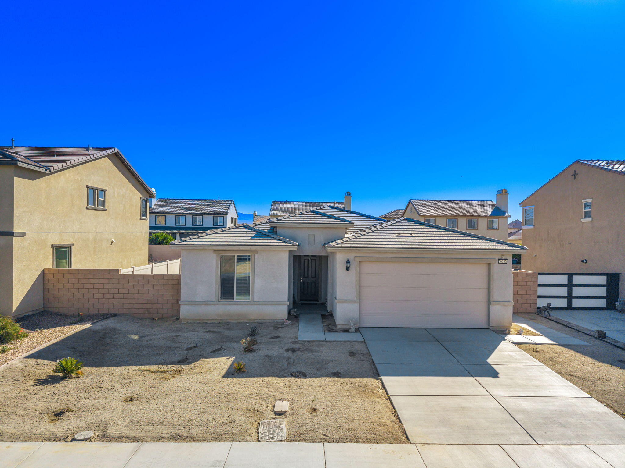 50252 Paseo Barcelona Coachella, CA 92236 - Photo 21 of 23 a view of a house with a terrace