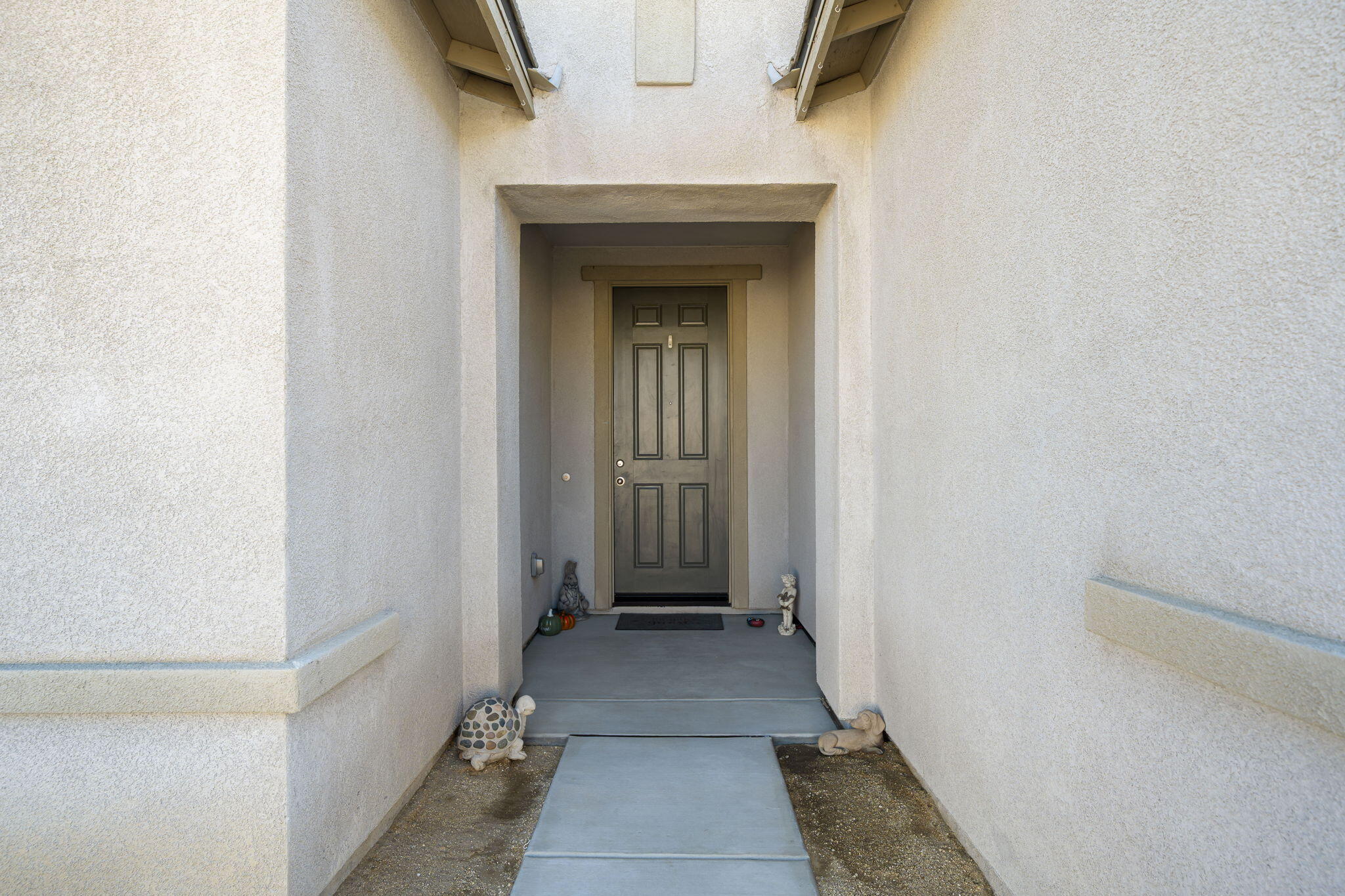 50252 Paseo Barcelona Coachella, CA 92236 - Photo 22 of 23 a view of a hallway with wooden floor