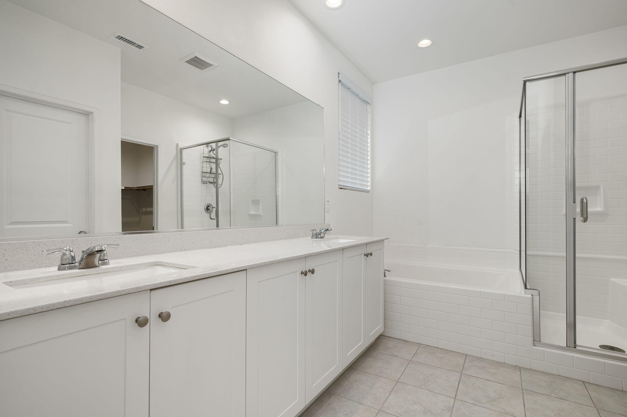 50252 Paseo Barcelona Coachella, CA 92236 - Photo 9 of 23 a bathroom with a bathtub shower sink vanity and mirror