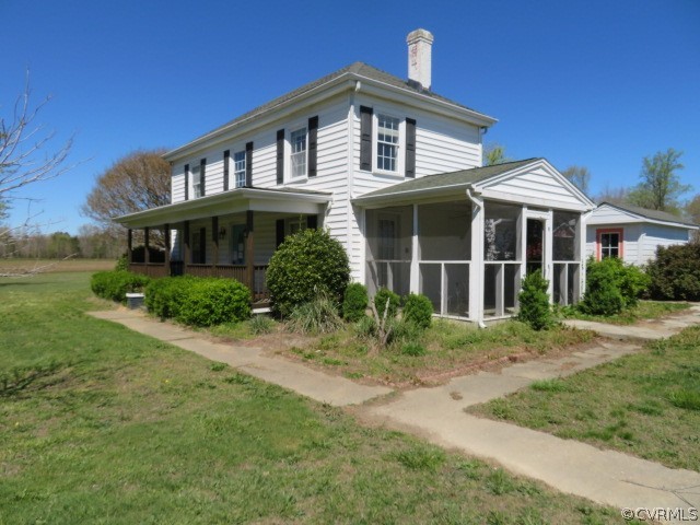 15212 Wilkinson Road Dinwiddie, VA 23841 - Photo 2 of 46 a front view of a house with garden
